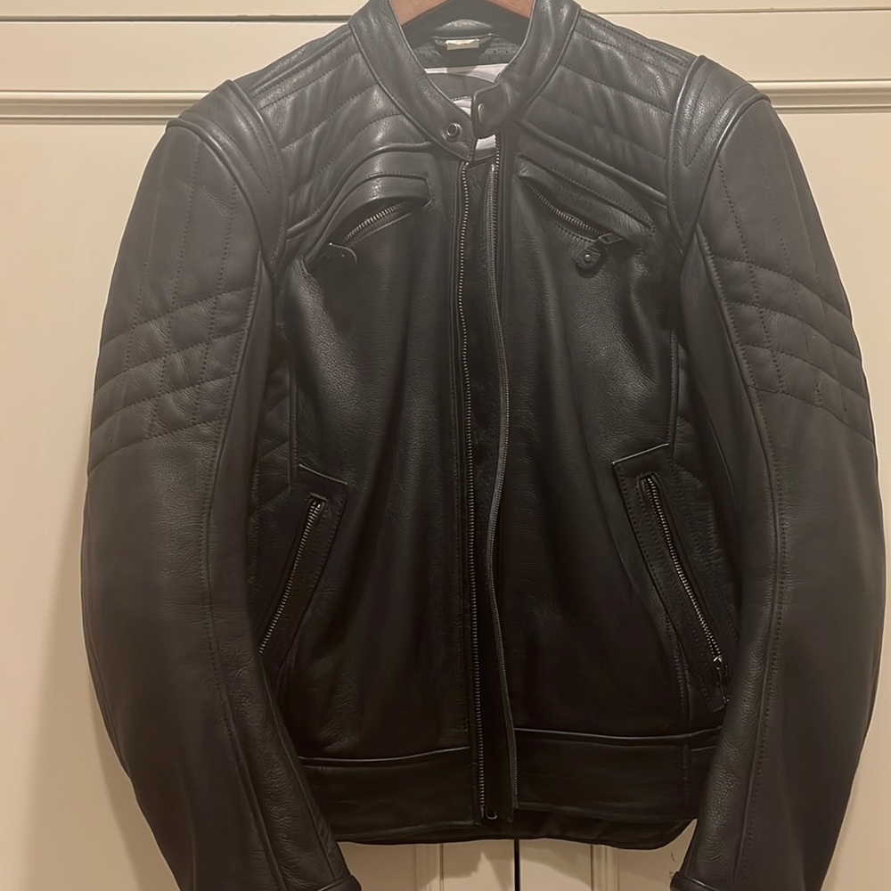 Never worn. Motorcycle suit jacket. All leather